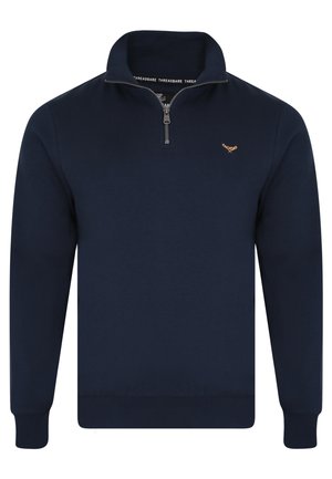 Felpa con zip di colore navy, realizzata in tessuto morbido. Presenta un colletto alto, polsini a coste e un piccolo logo ricamato sul lato sinistro del petto.