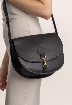 WIEBKE - Cross body bag - black