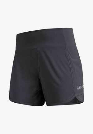 Svarta löparshorts med bred midjeresår, tillverkade i lätt material. Har mesh-paneler på sidorna och "GORE"-logotyp på fållen.