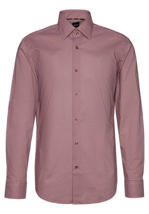 Miesten pitkähihainen kauluspaita, jossa pieni punavalkoinen geometrinen kuvio, napitettu edestä, klassinen kaulus ja napilliset kalvosimet.