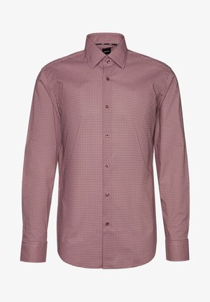 Langærmet herreskjorte med små røde og hvide geometriske mønstre, knappet foran, klassisk krave og knappede manchetter.