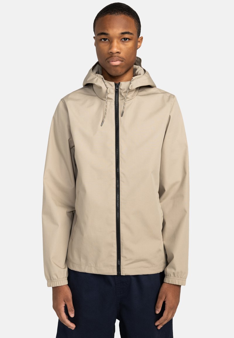 Beige leichte Jacke mit Kapuze, schwarzem Reißverschluss, elastischen Bündchen und Kordeln. Glatte Textur ohne sichtbare Muster oder Logos.