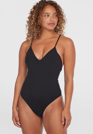 Zwarte badpak met een diepe V-hals, dunne bandjes en hoge uitsnijdingen, gemaakt van gladde stof met een minimalistisch ontwerp.
