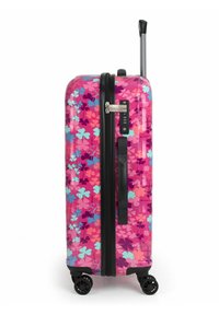 Trolley rigido con un motivo floreale rosa, caratterizzato da fiori turchesi e viola, zip nere e una maniglia telescopica in cima.