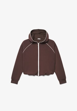 Sweat à capuche marron zippé avec des détails en passepoil blanc le long de la fermeture éclair, de la capuche et des manches, présenté à plat sur fond blanc.