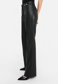 LIU JO FLARED - Pantaloni - black