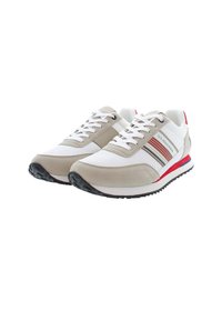 Beige and white sneakers featuring mesh and suede materials, lace-up closure, with red and navy accents and textured rubber sole.