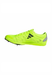 Scarpe da corsa neon gialle con tomaia in mesh, dettagli neri e tacchetti sulla suola per una migliore trazione. Design leggero che migliora le prestazioni.