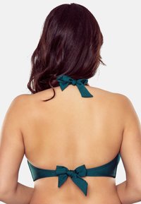 Teal bikini top met een gladde textuur, voorzien van twee gestrikte strikken bij de hals en de rug. Het ontwerp benadrukt een minimalistische, eigentijdse stijl.