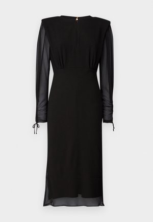 Rochie midi neagră cu umeri căptușiți, mâneci lungi transparente, talie strânsă și închidere la spate cu buton și deschidere în formă de cheie.