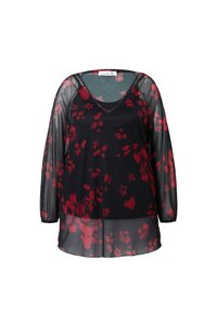 Blusa nera trasparente con maniche lunghe, caratterizzata da un motivo floreale rosso, scollo a V e una vestibilità rilassata. Texture morbida con estremità delle maniche arricciate.