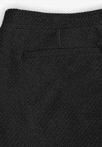 Next TEXTURED REGULAR FIT - Pantaloni - black