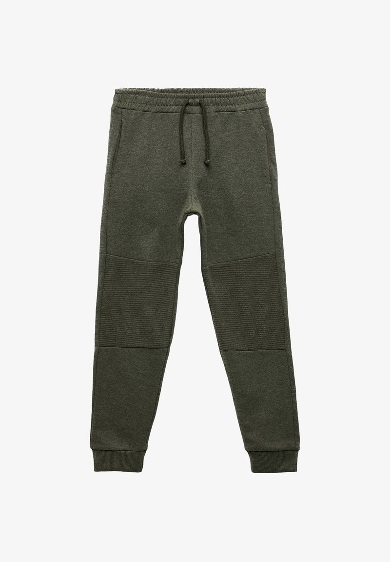Gröna sweatpants med en texturerad, ribbad panel vid knäna. Har resårmidja, dragsko och smalnade fotledsändar.