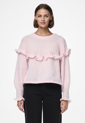 Maglione rosa lavorato a maglia con una texture a coste, caratterizzato da un orlo e polsini arricciati. La vestibilità ampia si sposa bene con uno stile informale.