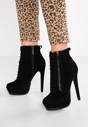 Enkellaarsjes met hoge hak - black