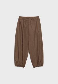 Pantalon marron ample et court avec taille élastique et bas élastiqués froncés, présenté à plat sur un fond clair.