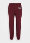 HERITAGE JOGGER - Pantaloni sportivi - ruby wine