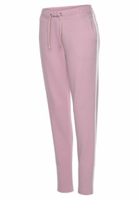 Hellrose Sweatpants mit einem Kordelzugbund, seitlichen Taschen und weißen seitlichen Streifen. Hergestellt aus weichem Stoff mit einem taillierten Beinschnitt.