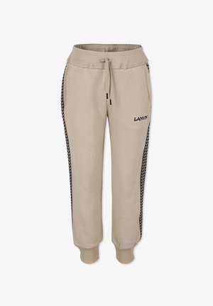 Beige joggers met elastische tailleband en trekkoord. De zijzakken hebben zwarte houndstooth accenten en een geborduurd logo op de rechterdij.