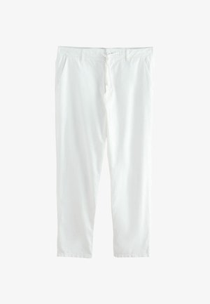 Witte katoenen broek met een losse pasvorm, voorzien van een elastische tailleband, twee zijzakken en een koordsluiting.