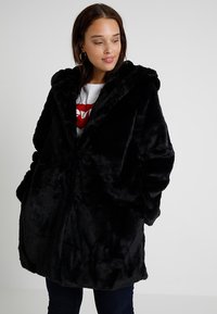 Urban Classics Curvy LADIES HOODED COAT - Winter coat - black