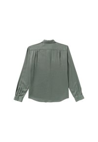 Langsleeve shirt in een gedempt groene stof. Heeft knoopmanschetten, een puntkraag en een rugplooi. Soepele textuur, slim fit.