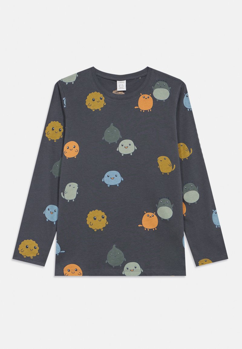 Mørkegrå langærmet skjorte, der viser farverige tegneseriefigurer i forskellige former og størrelser, herunder runde og fluffy design med smilende ansigtstræk.
