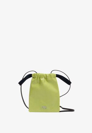 Lime green leather crossbody bag with a drawstring closure and black straps. Features a small silver logo at the front. Smooth texture.