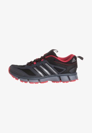 Scarpe da ginnastica nere e grigie con accenti rossi, dotate di una suola imbottita, tomaia in mesh traspirante e tre strisce argentate sul lato.
