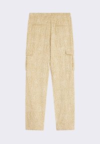 Pantaloni cargo beige con un motivo astratto bianco, vita elastica e diverse tasche laterali, realizzati in materiale morbido e tessuto.
