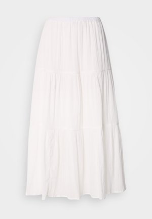 Fustă midi albă, în straturi, cu un brâu smocked, realizată dintr-un material moale și ușor, având o textură ușor vărsată.