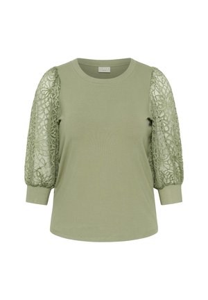 Olive green t-shirt with a round neckline, long sleeves featuring intricate lace detailing, and fitted cuffs. Smooth cotton body and textured sleeves.
