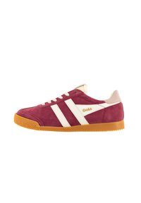 Suede burgundy sneaker with white stripes and gold logo. Features a textured rubber sole and beige accents on the heel and tongue.