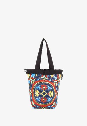 Borsa tote con manici neri e motivo floreale colorato a piastrelle in rosso, blu, giallo e verde, con chiusura a coulisse in alto.
