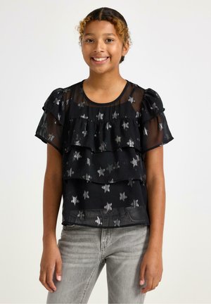 Black, short-sleeve top with layered ruffles and silver star patterns. Made of sheer material, featuring a round neckline and relaxed fit.