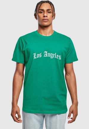 Green cotton t-shirt featuring "Los Angeles" in contrasting white font. Classic crew neckline and short sleeves, with a relaxed fit.