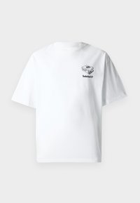 White cotton t-shirt with a crew neck, short sleeves, and a black graphic of a shoe box and "Timberland" logo on the left chest.