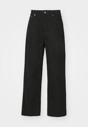 Mustad denim püksid otse säärekujundusega, viie tasku, nööpkinnituse ja klassikalise vöökoha. Sile tekstuur.