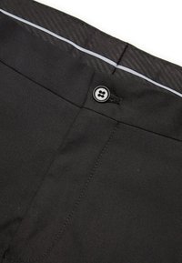 Pantalons noirs avec taille à fermeture à bouton et finition réfléchissante le long de la ceinture intérieure.