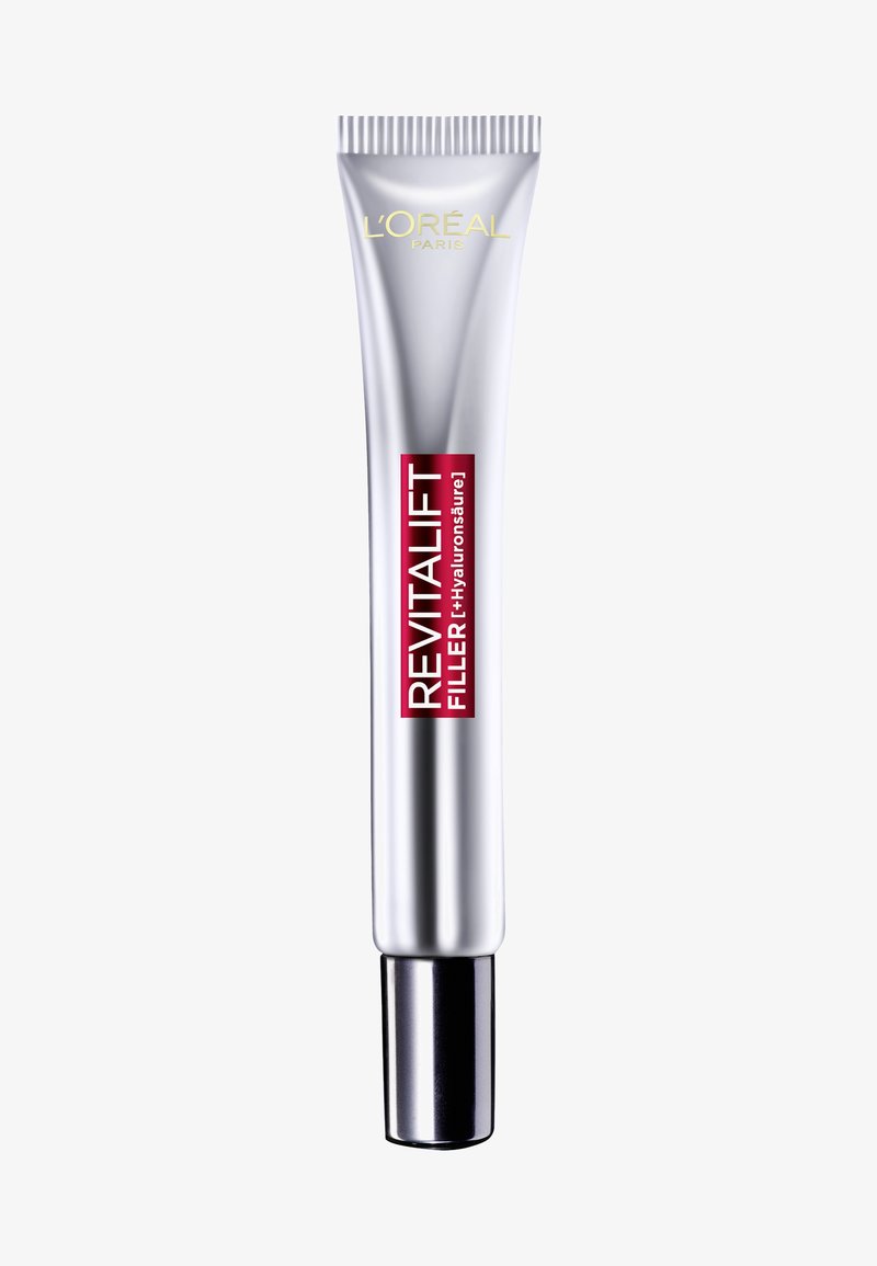 L'Oréal Revitalift Filler Tube in silbernem Metall mit feiner Düse, ausgestattet mit einem auffälligen roten Etikett mit weißem Text, der auf Hyaluronsäure hinweist.