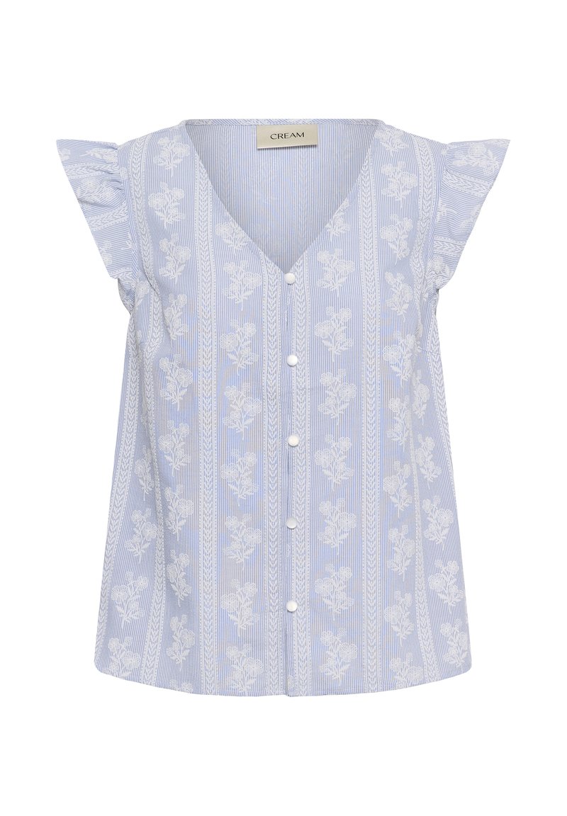 Blouse sans manches bleu clair avec broderie florale blanche, col en V, épaules volantées et une rangée de boutons blancs à l'avant.