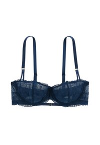 Soutien-gorge en dentelle marine avec des bonnets en tulle, motif floral, bords festonnés, bretelles ajustables et un petit détail en métal doré au centre.