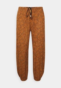 Spodnie w cętki w kolorze pomarańczowym i czarnym, wykonane z lekkiego materiału. Posiadają elastyczny pasek w talii z sznurkiem do regulacji i zwężane mankiety.