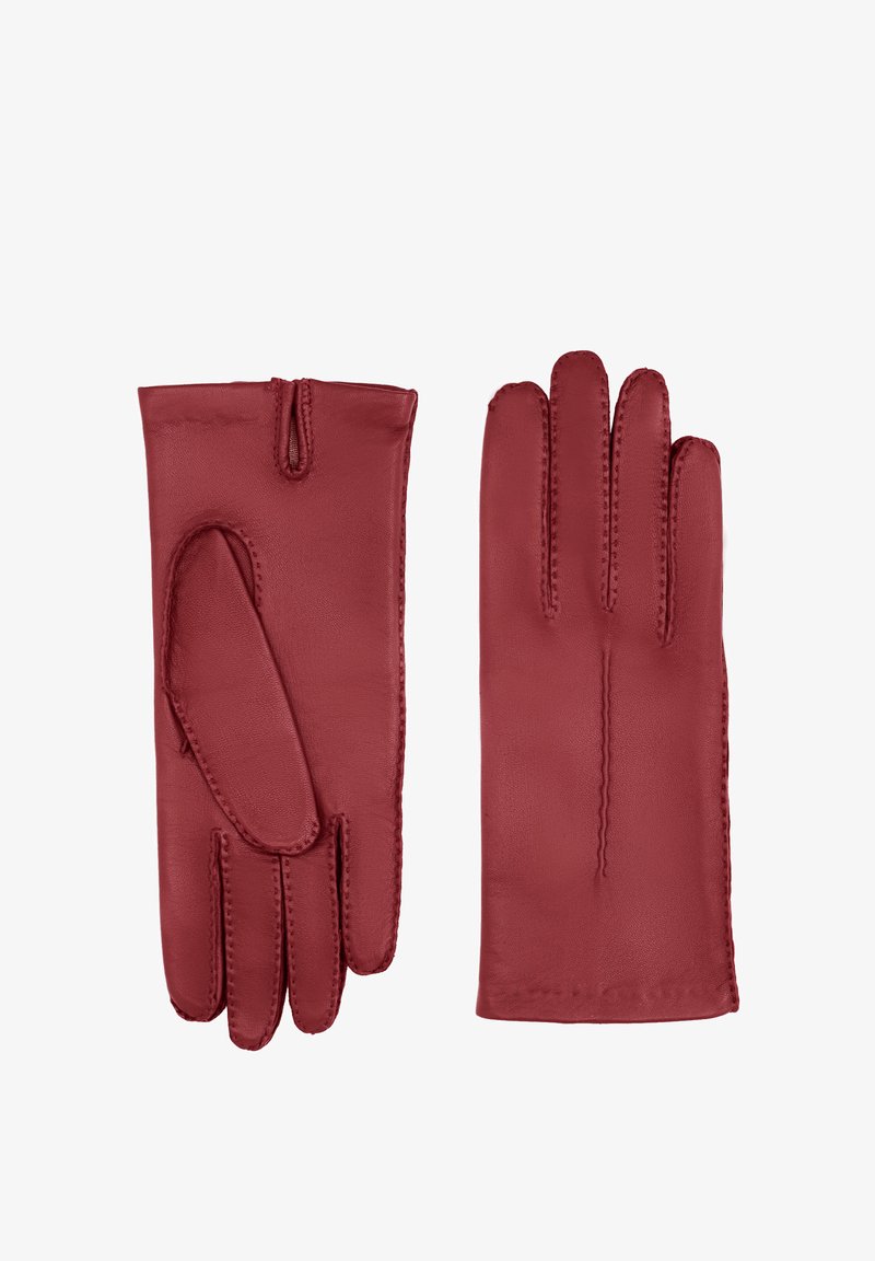 Gants en cuir rouge avec une construction sans couture, une texture lisse et des détails cousus à la main. Un gant présente un design à doigts ouverts.