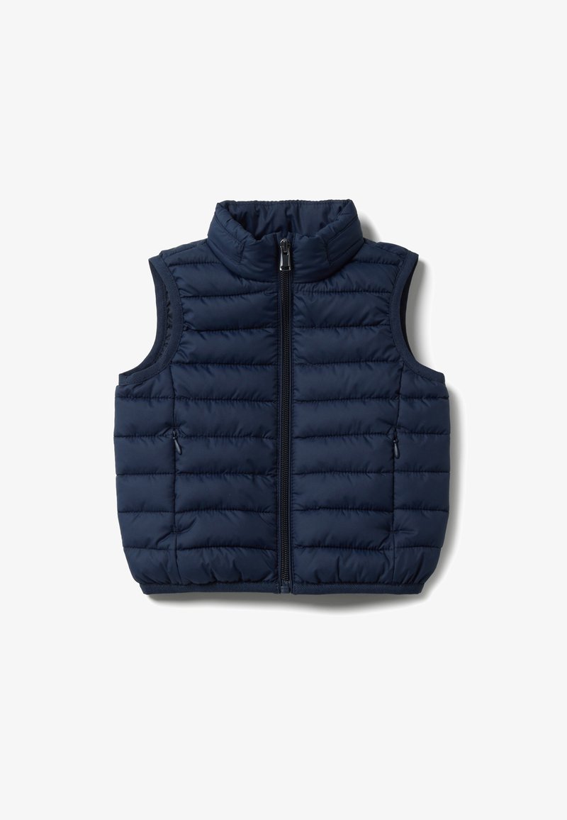 Veste matelassée sans manches bleu marine avec fermeture éclair frontale, col montant et poches latérales zippées, conçue pour la chaleur et le confort léger.
