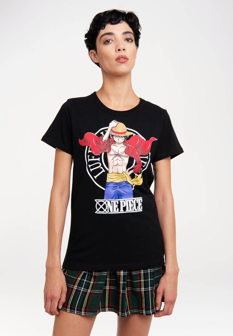 Black cotton t-shirt featuring a colorful print of a character with a straw hat and red cape, set against a circular logo background.