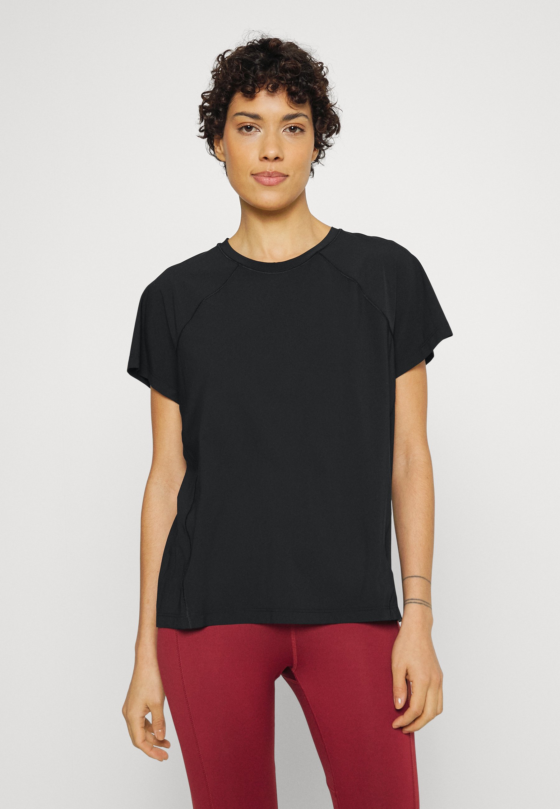 Athleta ULTIMATE - Camiseta deportiva black/negro - Zalando.es