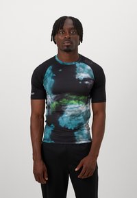 Black athletic shirt with colorful, abstract cloud pattern in teal and green. Short sleeves, fitted design, and subtle branding on shoulder.
