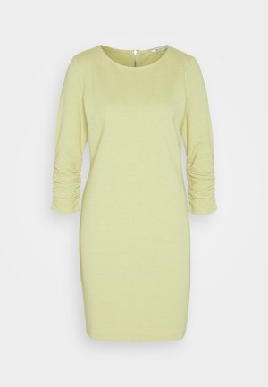 Heled kollase tekstuuriga põlvekohal olev kleit, millel on kolmeveerandi pikkuses rulli kinnitatud varrukad ja taga tõmblukukinnitus.