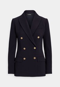 Blazer azul-marinho de abotoamento duplo com botões dourados, lapelas com entalhe, dois bolsos frontais e um bolso no peito, apresentando uma textura de tecido suave.